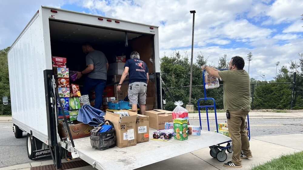 Volunteers loading a truck