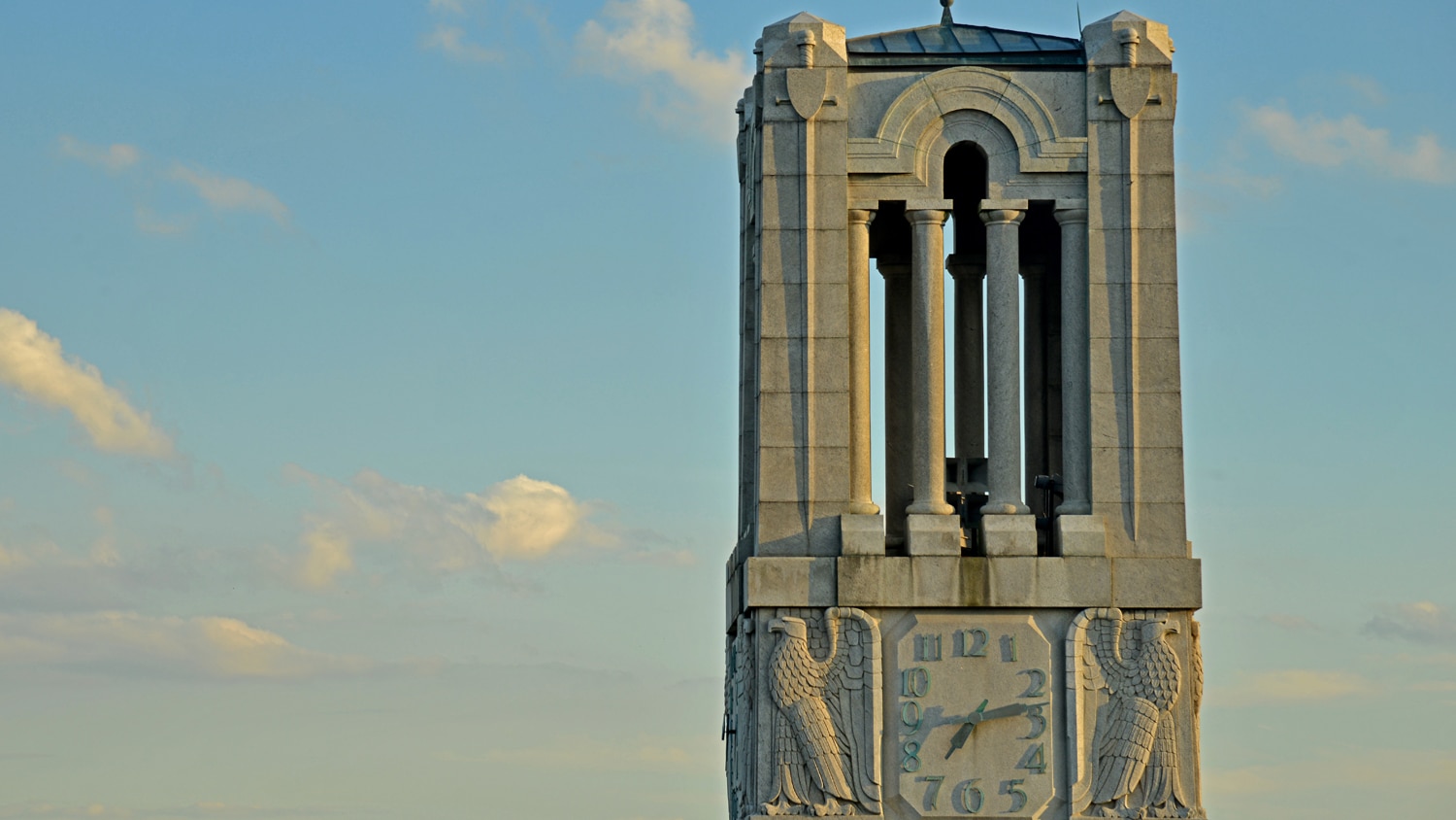 Late afternoon sun paints the NC State Belltower.