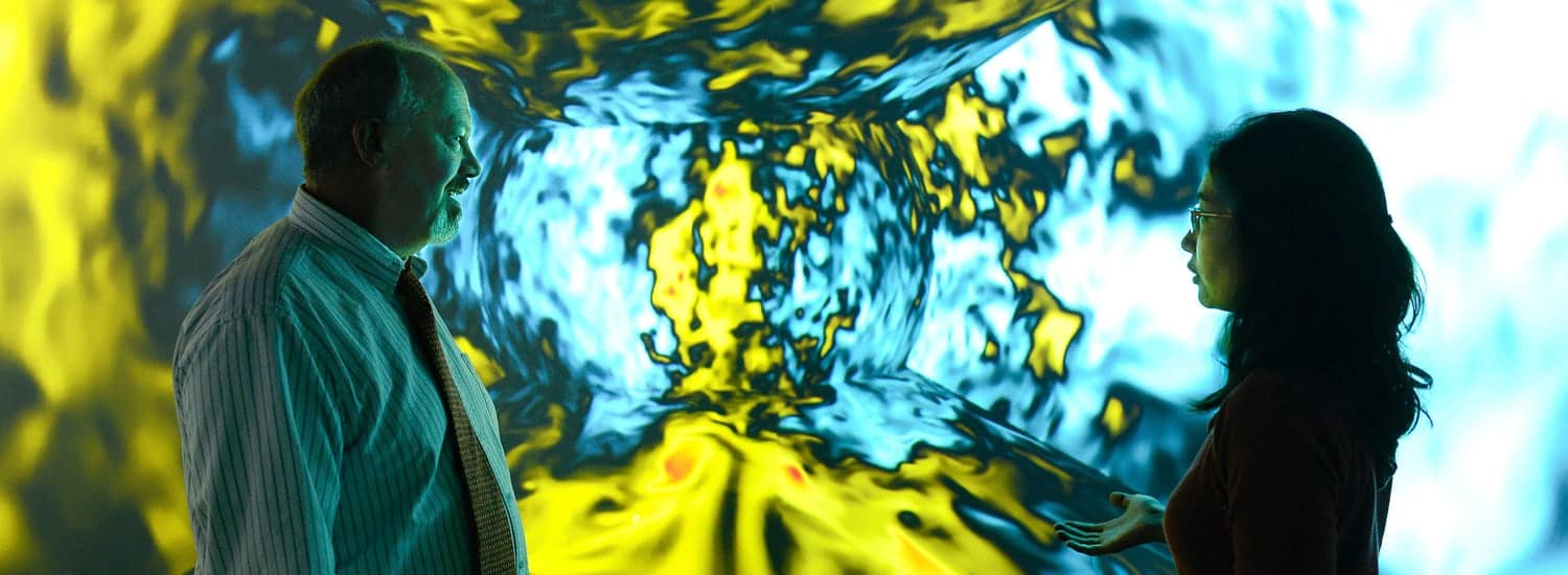 Mia de los Reyes in visualization lab