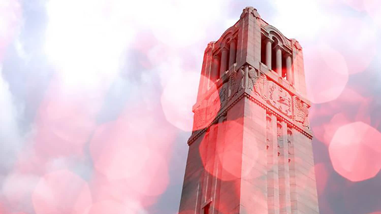 NC State belltower with a red filter