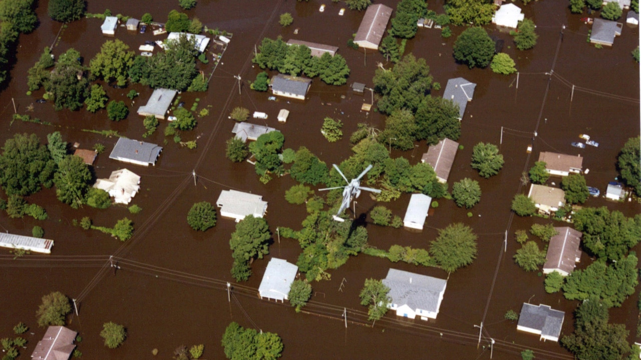 A helicopter flies over flooding in Edgecombe County. (Photo by Dave Saville/FEMA)