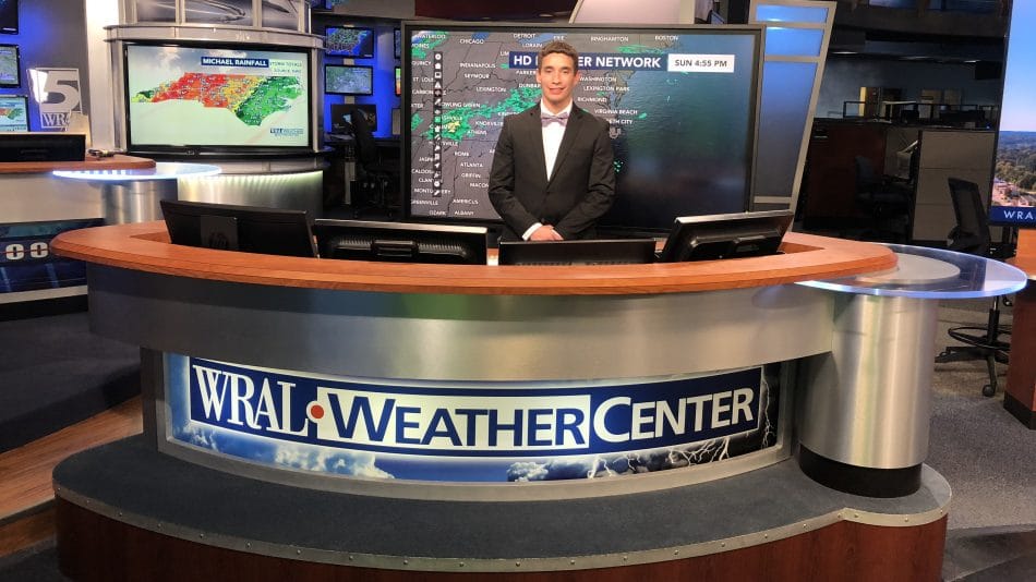 Clay Chaney behind the desk in the WRAL Weather Center