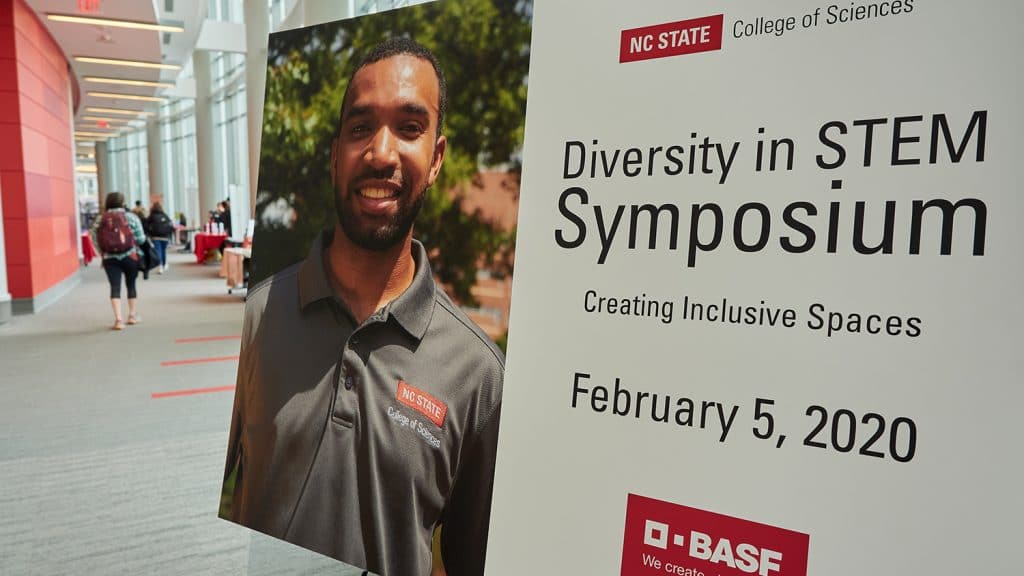 Diversity in STEM Symposium sign in a hallway