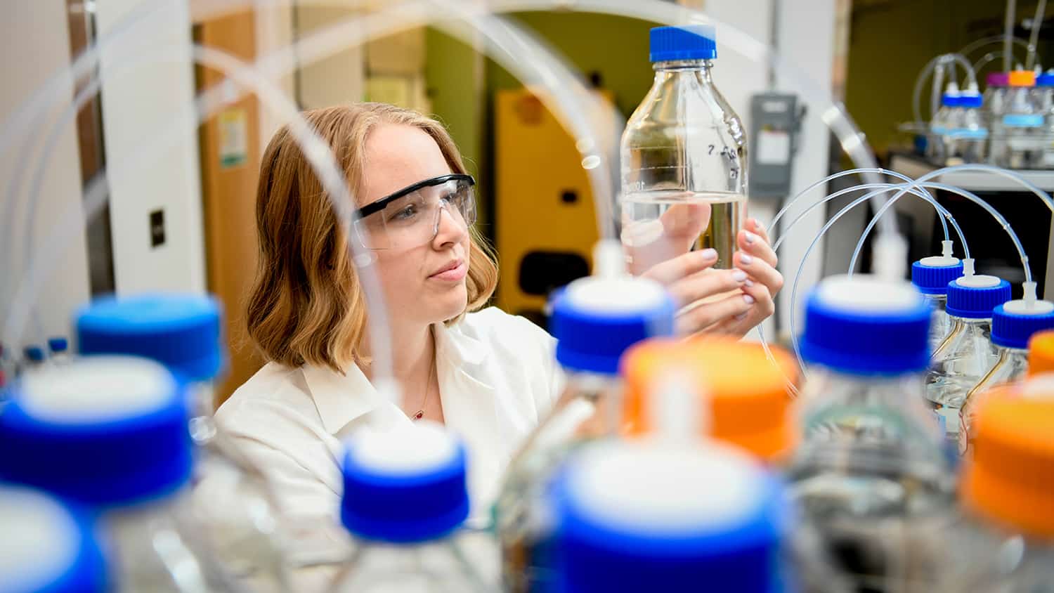 Graduate student Kaylie Kirkwood works in a chemistry lab