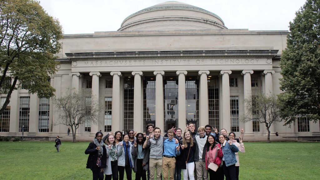 A group of Goodnight Scholars stand in front of Massachusetts Institute of Technology.