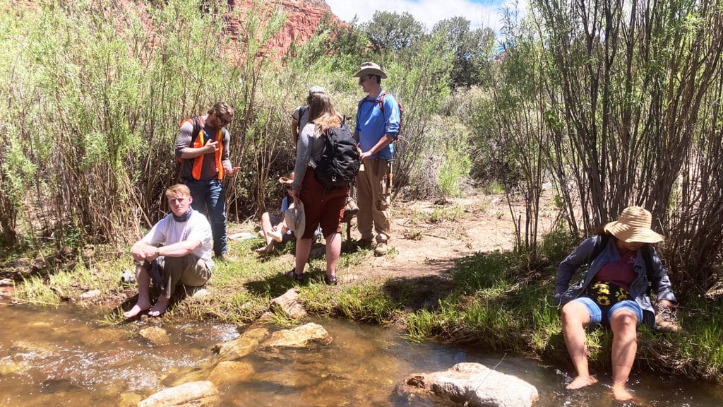 Students cross the Rio Guadalupe in New Mexico.