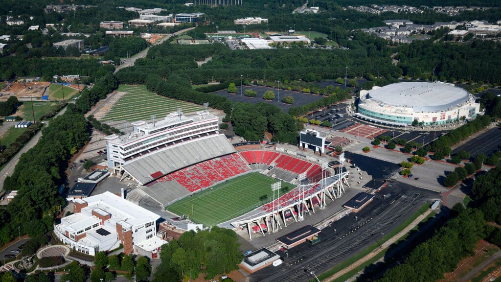 An aerial view of Carter-Finley Stadium, with the PNC Arena visible in the background.