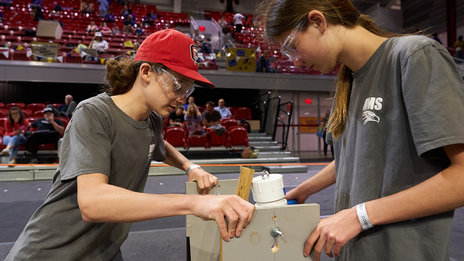 Two girls work on a science project at the 2023 Science Olympiad State Tournament