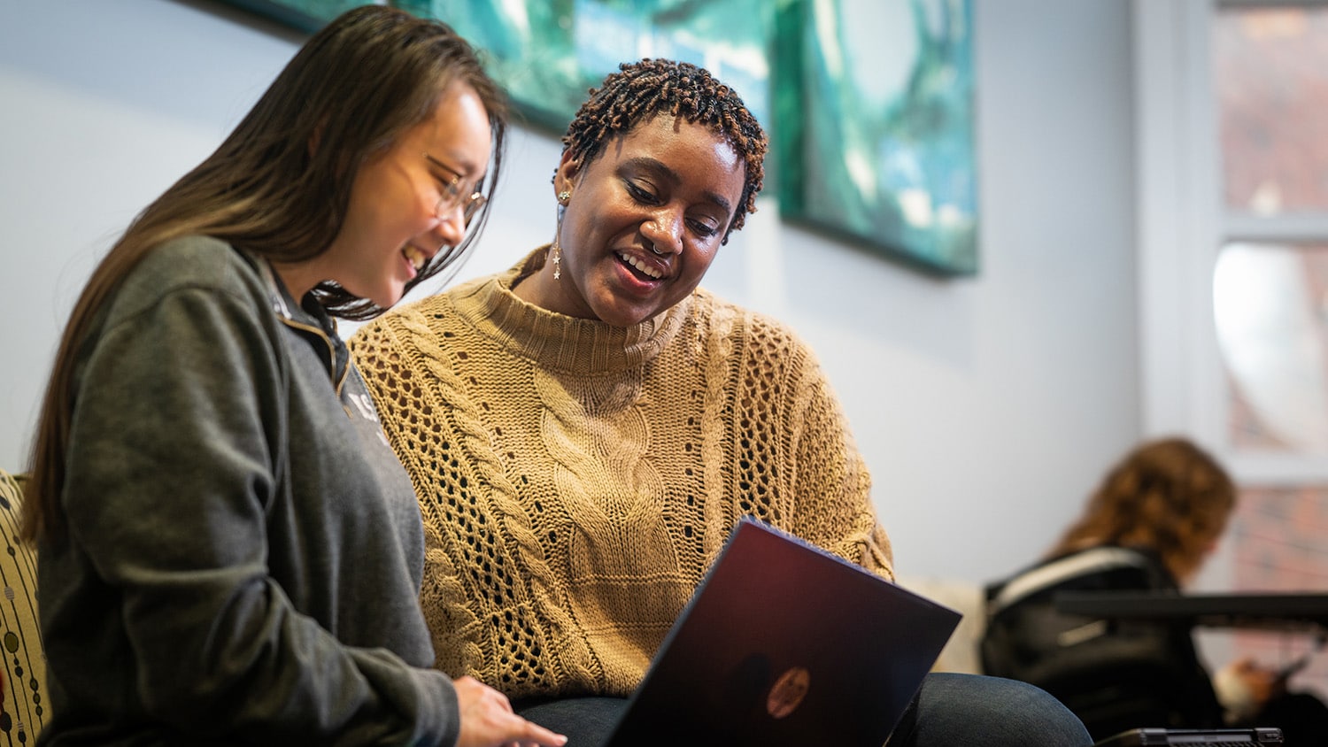 Two College of Sciences undergraduate students work and collaborate in David Clark Labs on main campus.