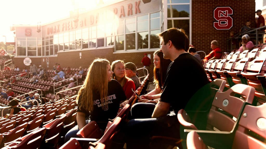 NC State students sit on the stands at Doak Field at Dail Park