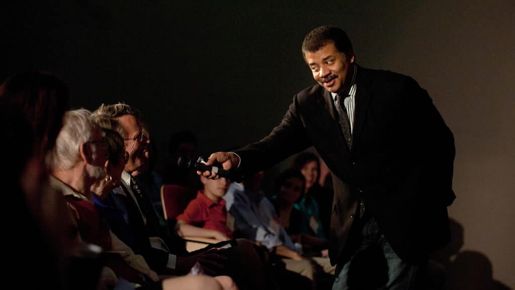 Neil deGrasse Tyson interacts with the crowd during his 2014 talk at NC State