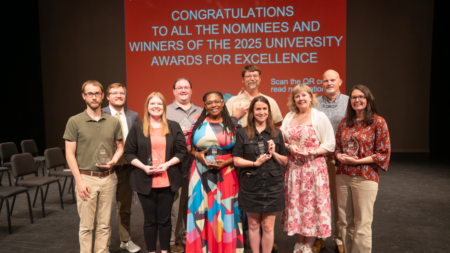 Ten of the 12 2025 Award for Excellence winners posed for a picture after a June 3 awards ceremony. They are (front row left to right): Adam Bensley, Taylor Reynolds, LaShawn McLamb, Kathie Dello, Deidre Hartley and Holly Jordan; (back row left to right) Douglas Rowe, Jamie Pendergrass, Jesse Proctor and Ricky Hilburn.