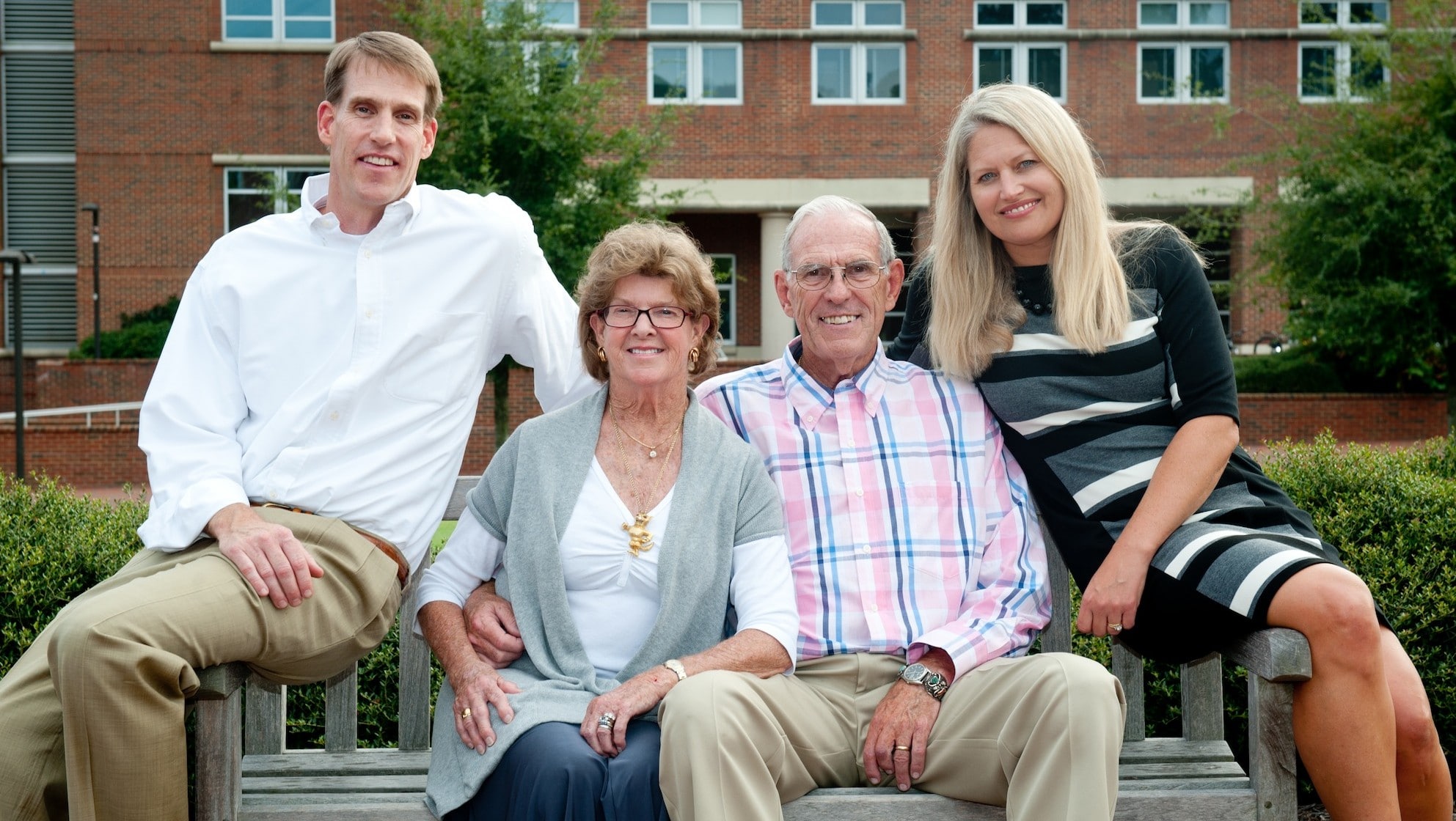 Multi-generational family portrait of College supporters