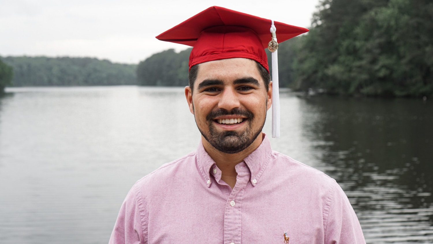 Michael Evans in front of Lake Raleigh
