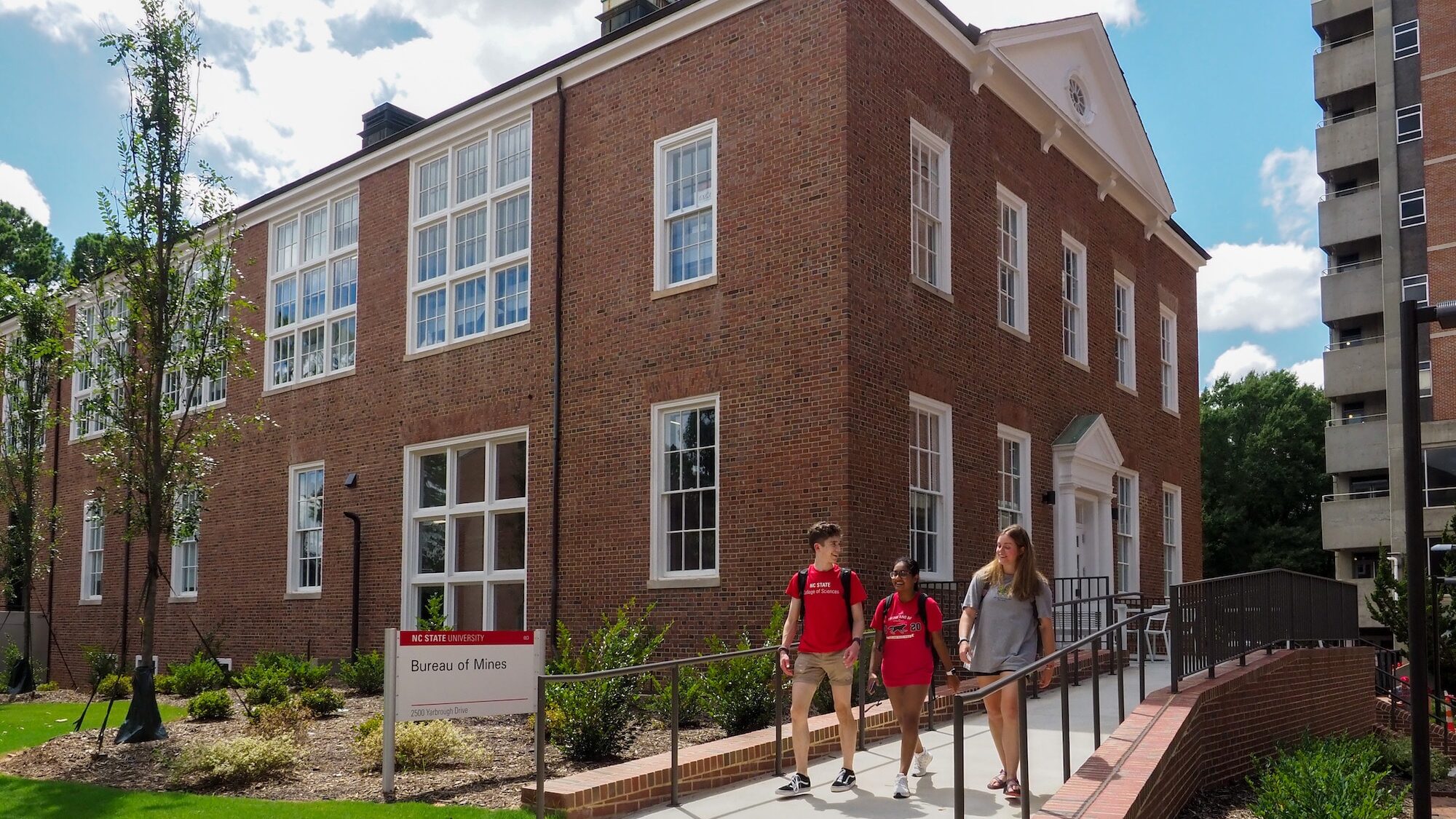 Students walking in front of Bureau of Mines